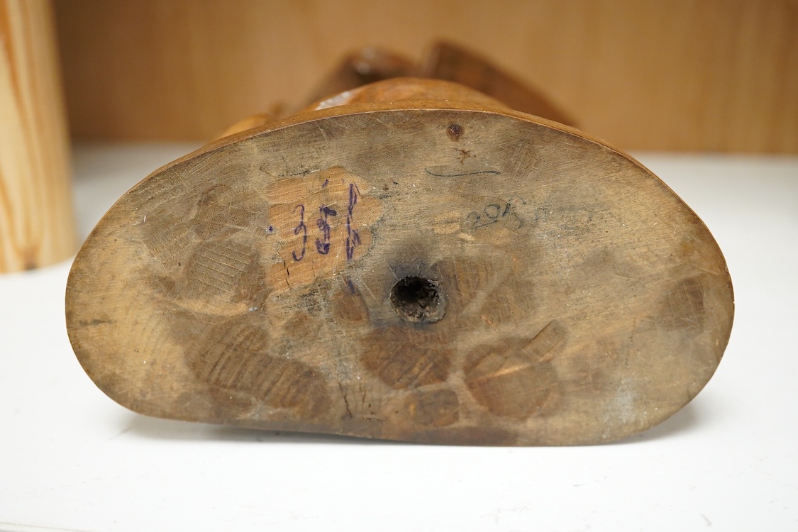 A late 19th century Black Forest carving, chamois group and eagle, 21cm